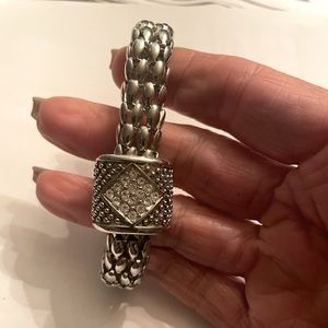 Women’s magnetic silver bracelet with diamond chips.